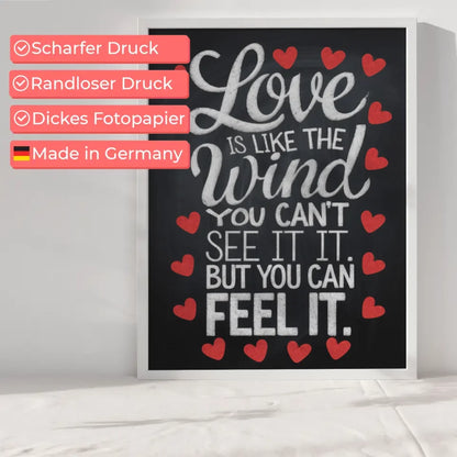 Poster mit leuchtender LOVE Leuchtreklame in Rosa und Orange