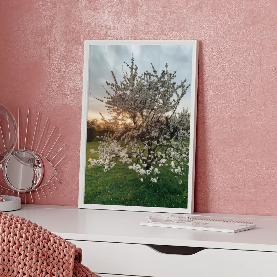 Poster blühender Baum auf grüner Wiese mit gelben Blumen für dein Zuhause