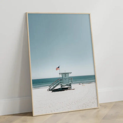 Ruhe am Strand Poster mit Rettungsturm und blauem Himmel kaufen