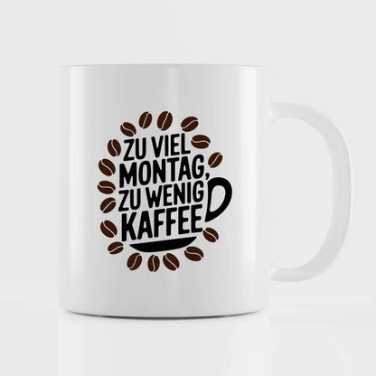 Kaffeetasse mit Spruch Zu viel Montag zu wenig Kaffee im Design