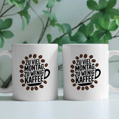 Kaffeetasse mit Spruch Zu viel Montag zu wenig Kaffee im Design