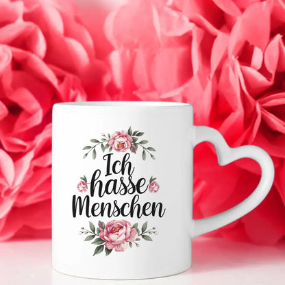 Lustige Sprüche Tasse mit blumigem Design Ich hasse Menschen in Schwarz