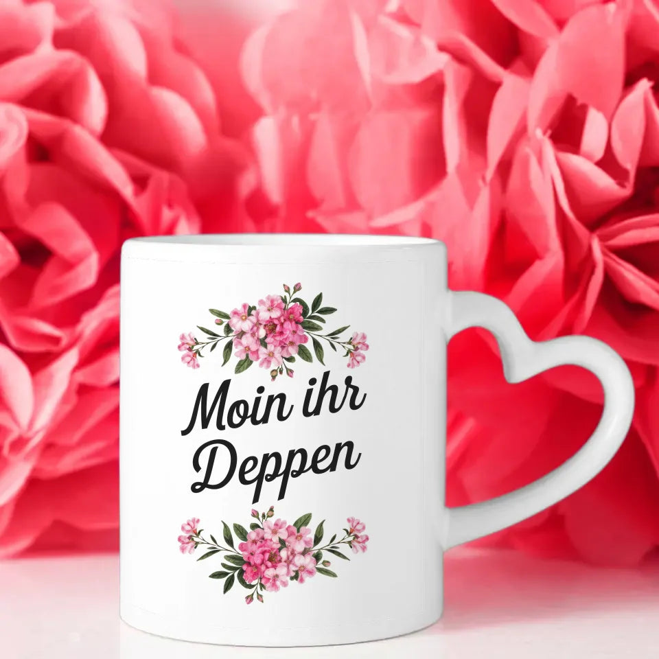 Lustige Tasse mit Spruch Moin ihr Deppen und Blumenarrangement