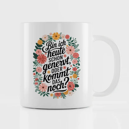 Lustige Tasse mit motivierendem Spruch und buntem Blumenmuster