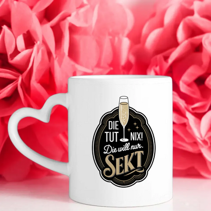Lustige Tasse mit Abzeichen und Spruch die tut nix Sekt