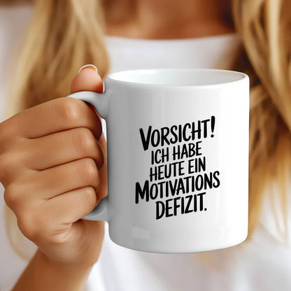 Tasse mit lustigem Spruch Motivationsdefizit für einen Lächelnmacher
