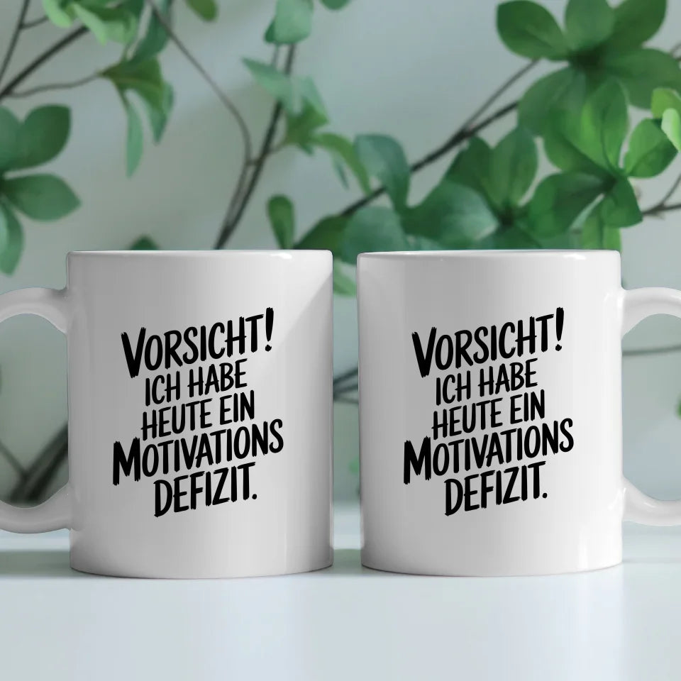 Tasse mit lustigem Spruch Motivationsdefizit für einen Lächelnmacher