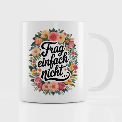 Lustige Tasse mit Frag einfach nicht und bunten Blumen