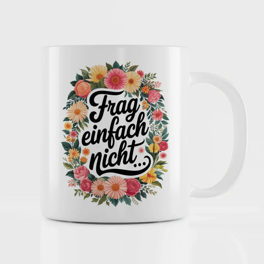Lustige Tasse mit Frag einfach nicht und bunten Blumen