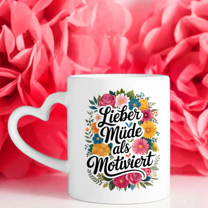 Lustige Tasse mit Motivationsspruch und bunten Blumen