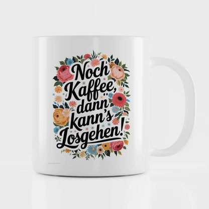 Lustige Tasse mit Blumen und Spruch Noch Kaffee dann kanns losgehen