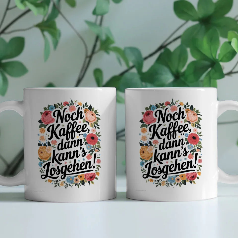 Lustige Tasse mit Blumen und Spruch Noch Kaffee dann kanns losgehen